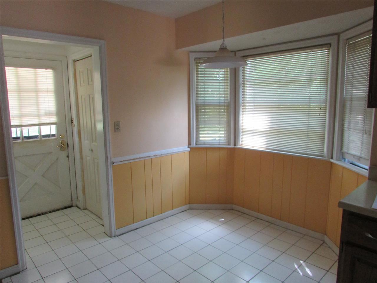 6280 Park Ridge Road Loves Park, IL 61111 - Photo 13 of 25 an empty room with windows
