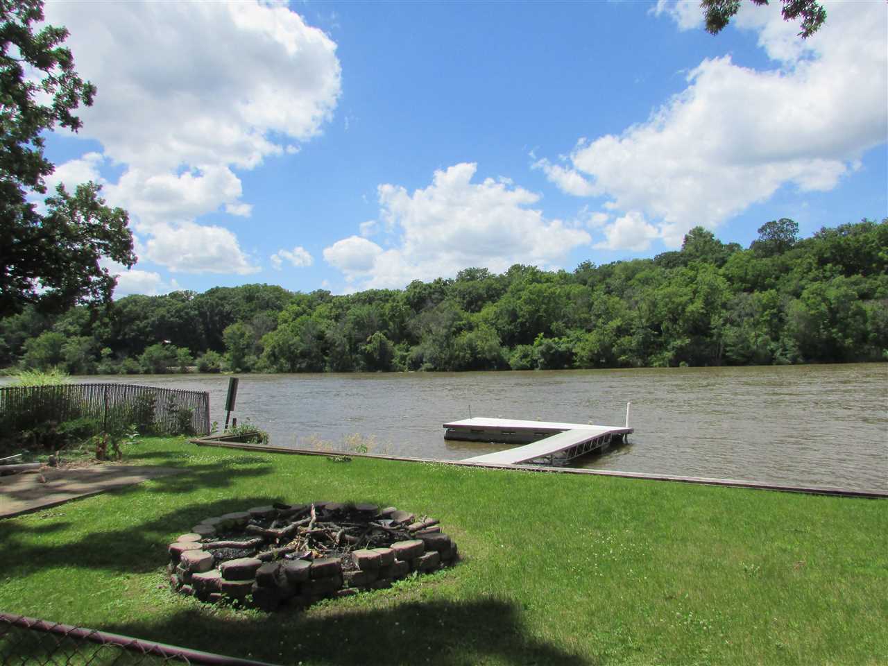 6280 Park Ridge Road Loves Park, IL 61111 - Photo 18 of 25 a view of a lake with outdoor space