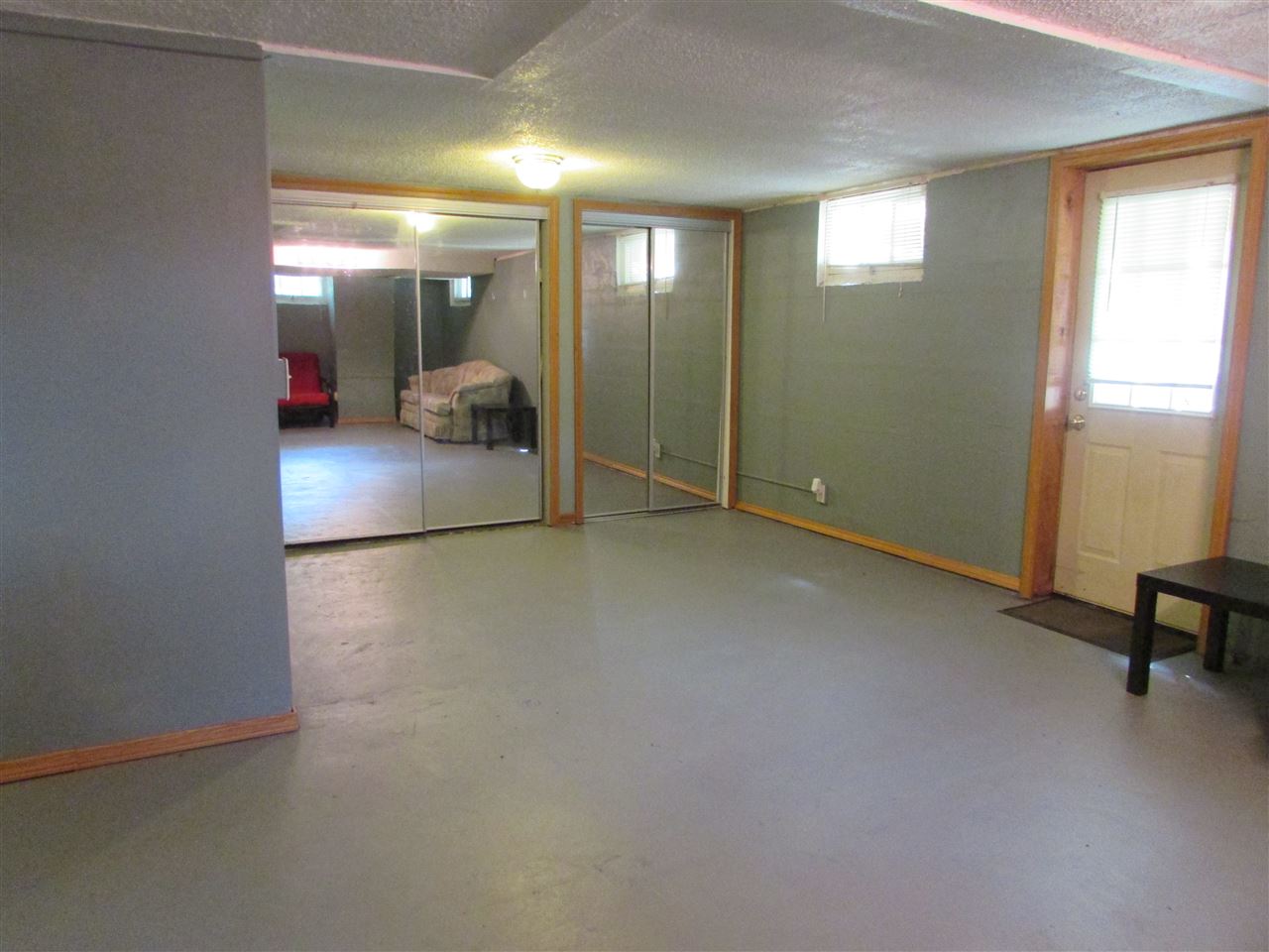 6280 Park Ridge Road Loves Park, IL 61111 - Photo 21 of 25 a view of a hallway with a chair and a window