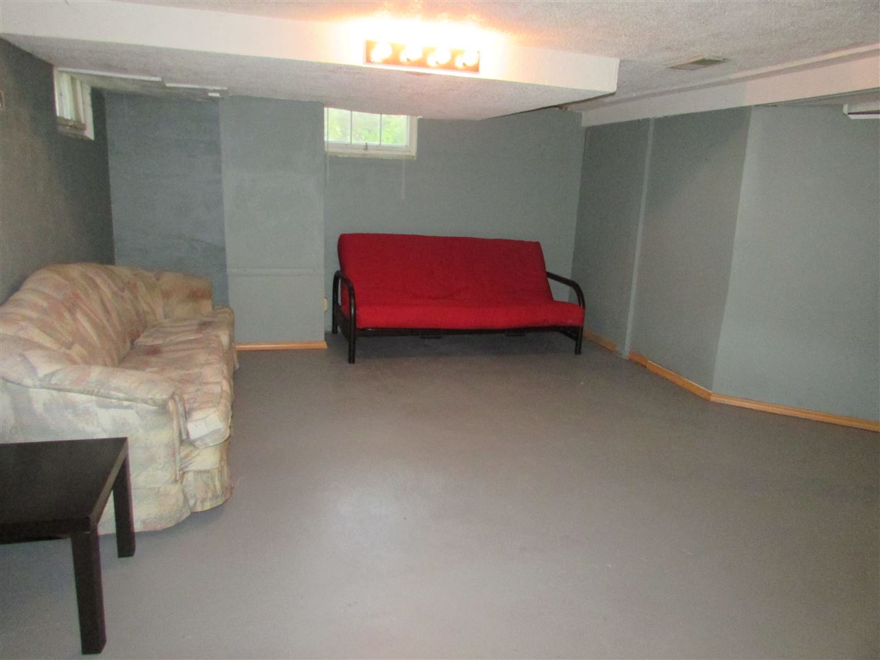 6280 Park Ridge Road Loves Park, IL 61111 - Photo 22 of 25 a living room with furniture and a couch