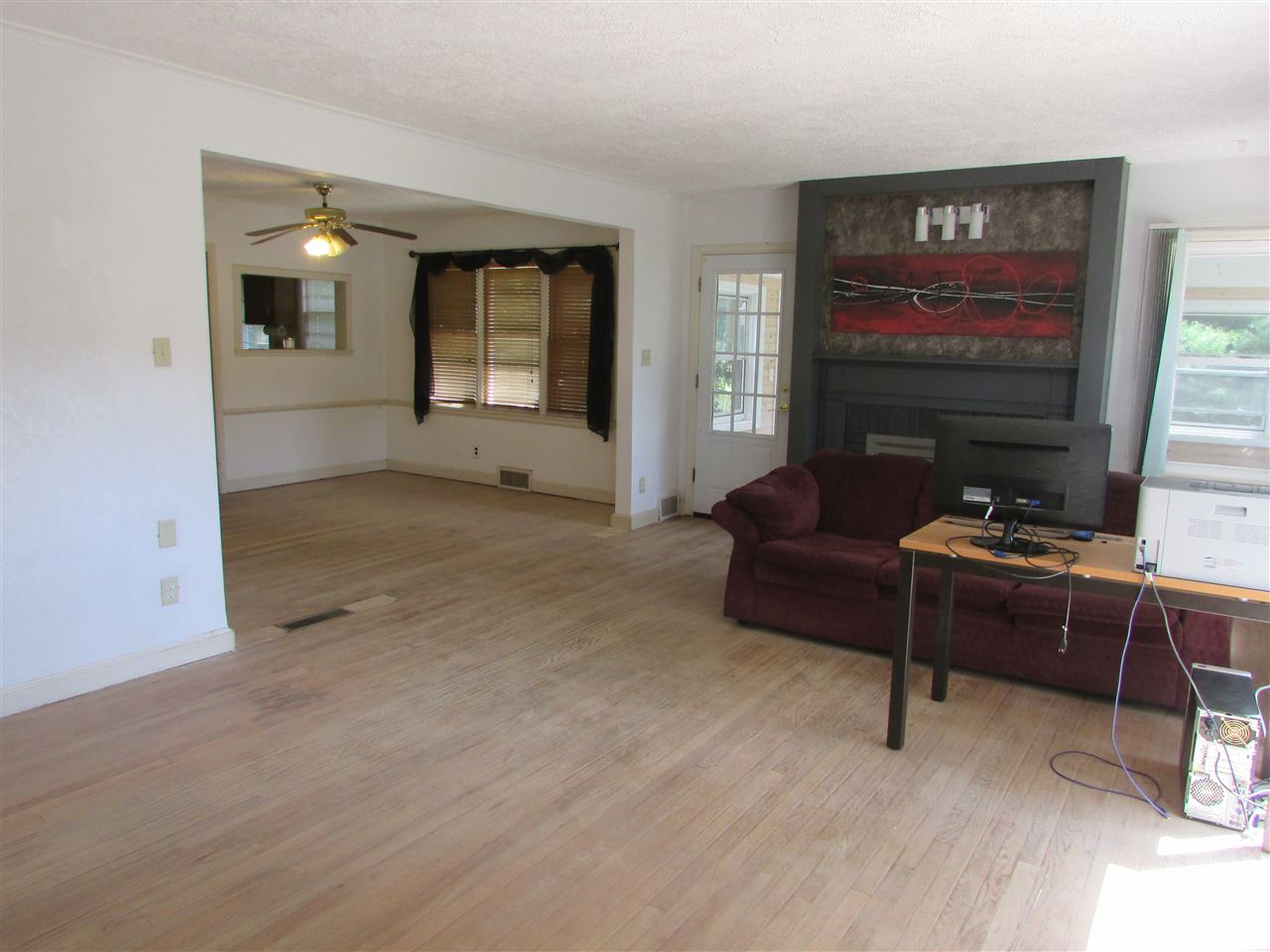 6280 Park Ridge Road Loves Park, IL 61111 - Photo 8 of 25 a living room with furniture and a flat screen tv