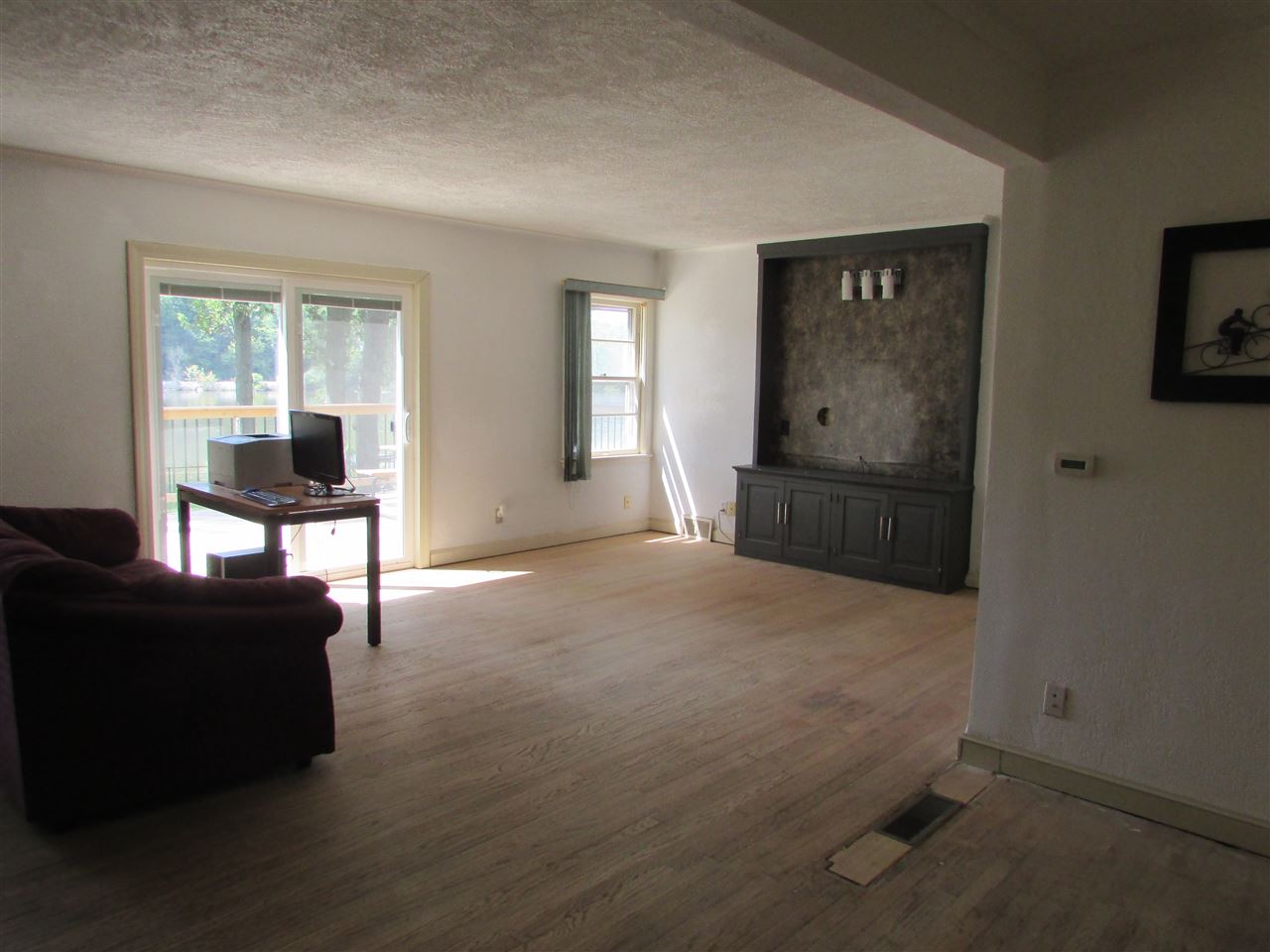 6280 Park Ridge Road Loves Park, IL 61111 - Photo 10 of 25 a bedroom with furniture and a flat screen tv