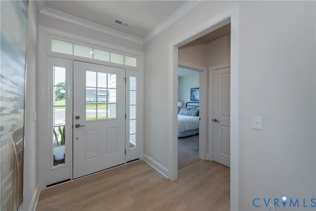 a view of storage and utility room with washer and dryer