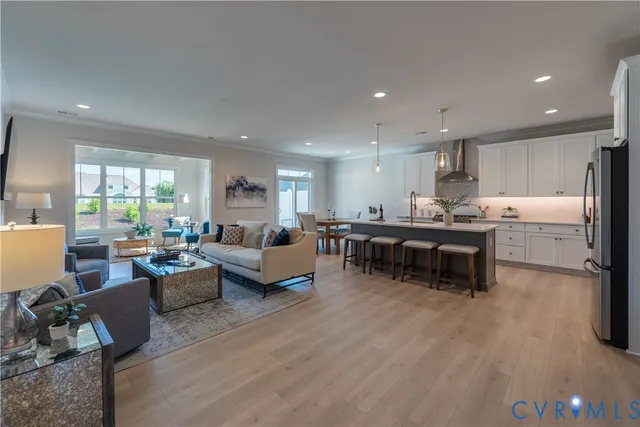 a living room with furniture and a table