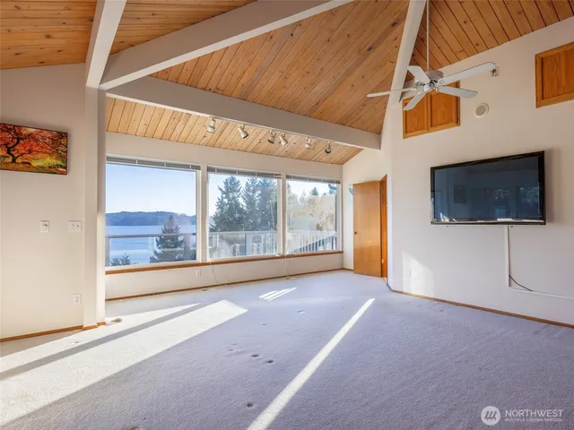 a bathroom with a bathtub and a toilet