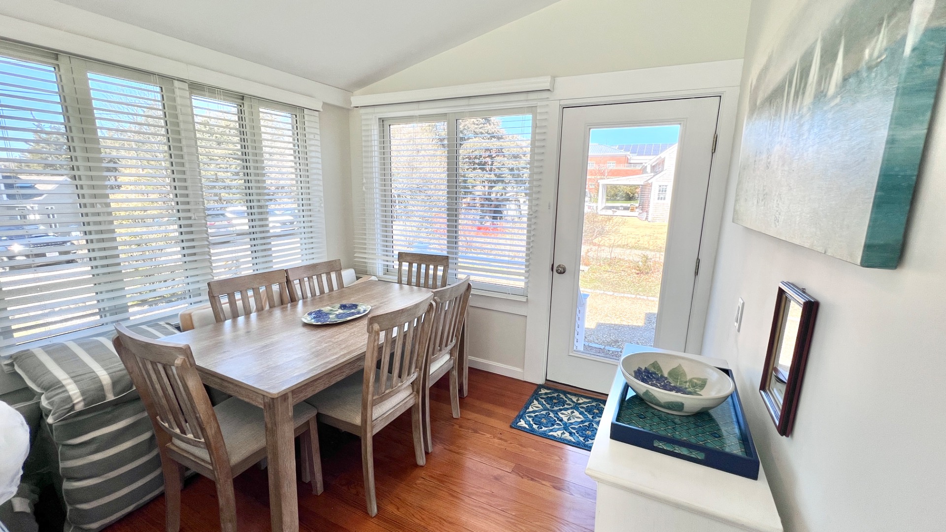 34 Windemere Road Oak Bluffs, MA 02557 - Photo 25 of 64 a view of a dining room with furniture window and wooden floor