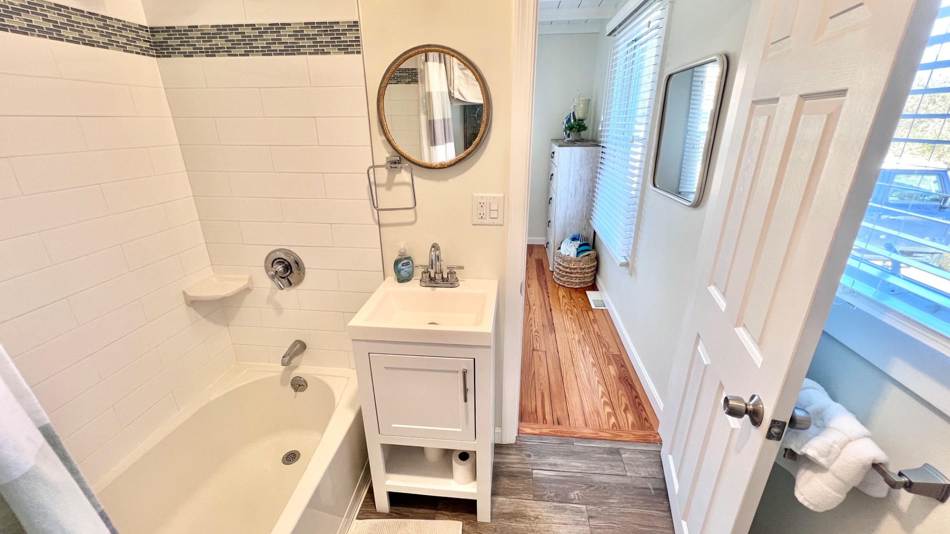 34 Windemere Road Oak Bluffs, MA 02557 - Photo 29 of 64 a bathroom with a sink a bathtub and a shower