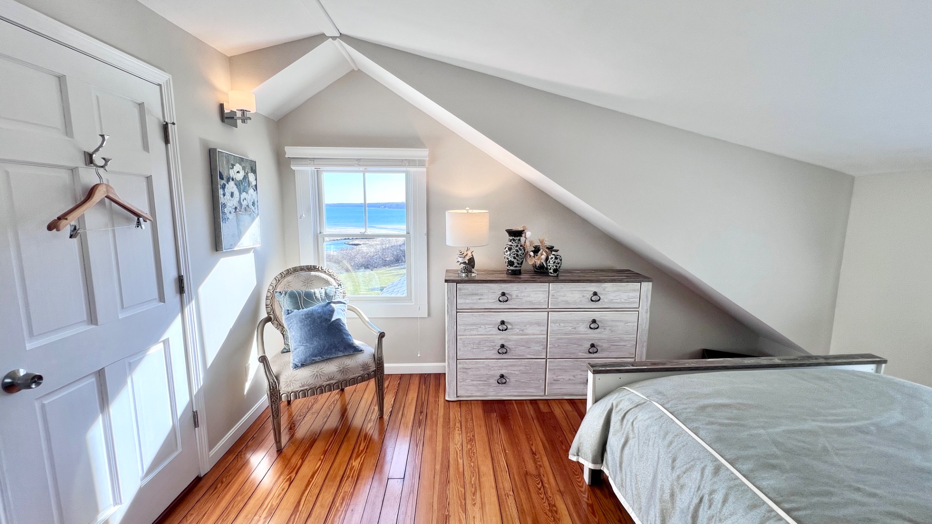 34 Windemere Road Oak Bluffs, MA 02557 - Photo 34 of 64 a view of a livingroom with wooden floor and stairs