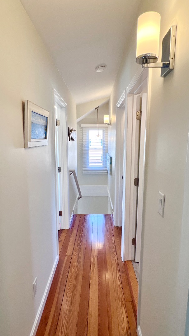 34 Windemere Road Oak Bluffs, MA 02557 - Photo 37 of 64 a view of a room with wooden floor staircase and a bathroom