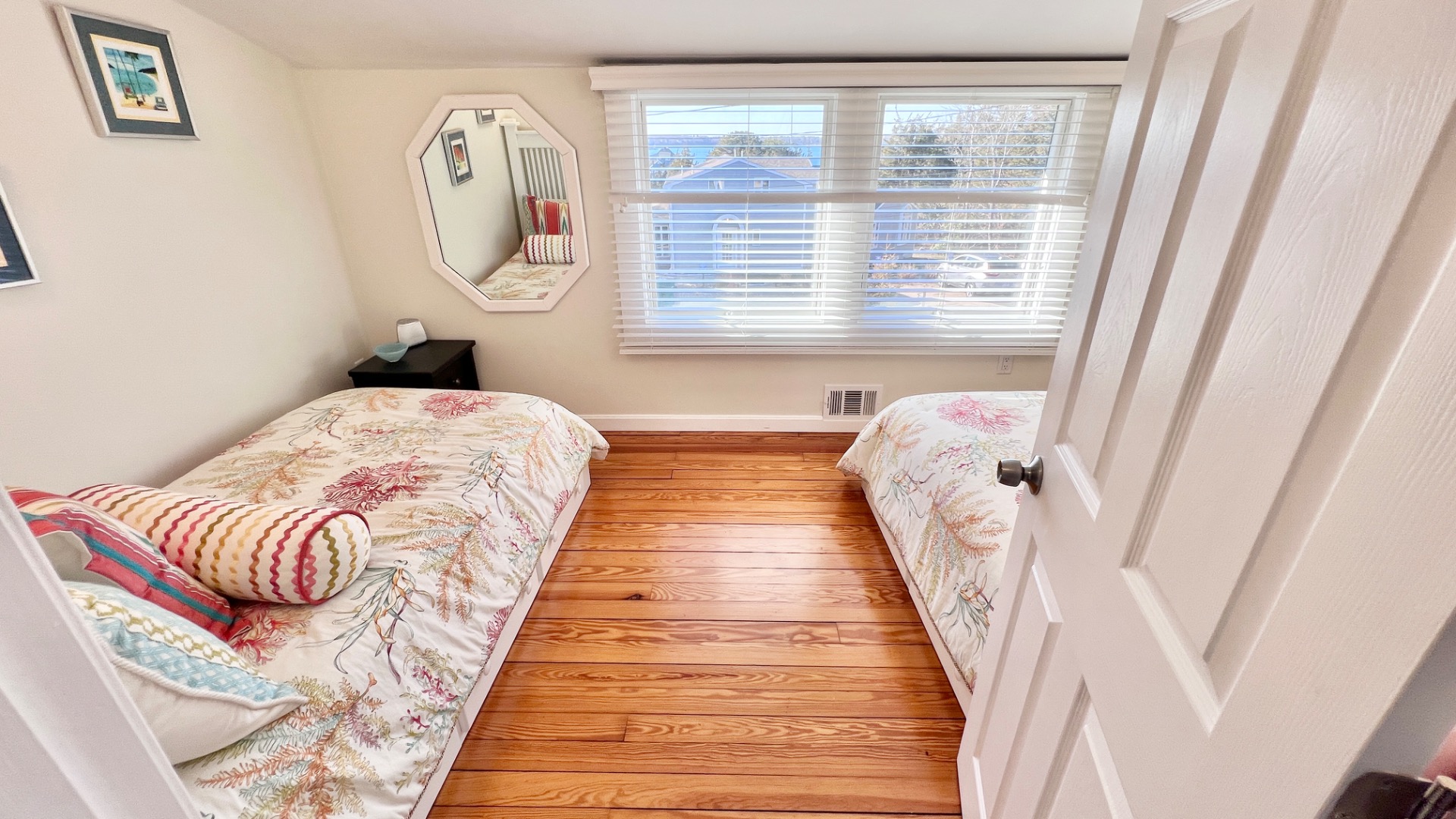 34 Windemere Road Oak Bluffs, MA 02557 - Photo 39 of 64 a bed sitting in a bedroom next to a window
