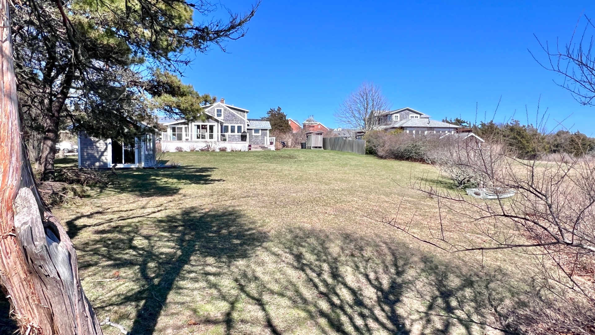 34 Windemere Road Oak Bluffs, MA 02557 - Photo 50 of 64 a view of a house with a yard