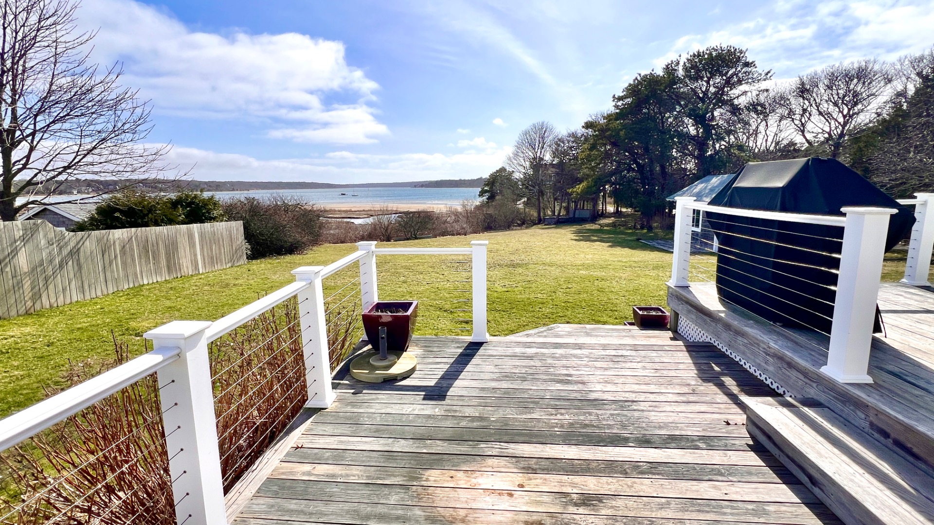34 Windemere Road Oak Bluffs, MA 02557 - Photo 56 of 64 a view of a balcony with wooden floor