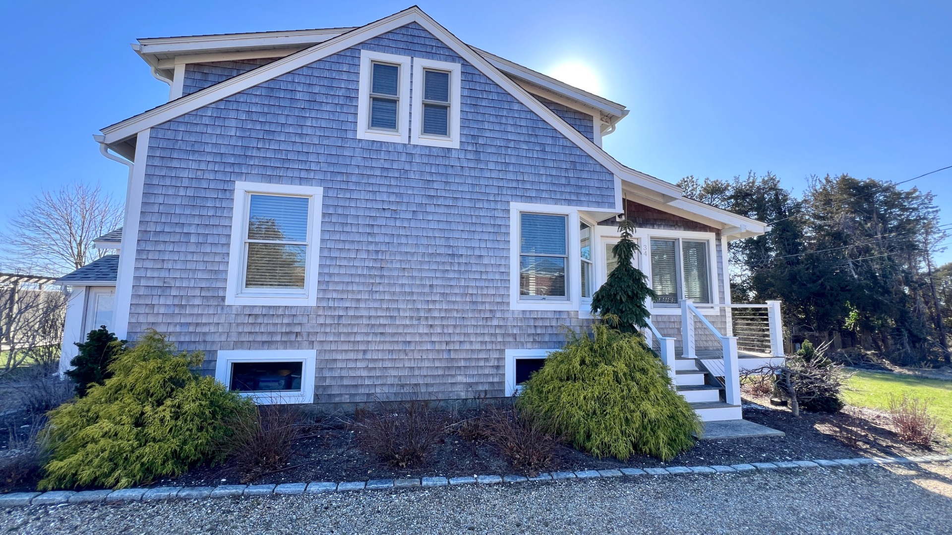 34 Windemere Road Oak Bluffs, MA 02557 - Photo 58 of 64 a front view of a house with garden