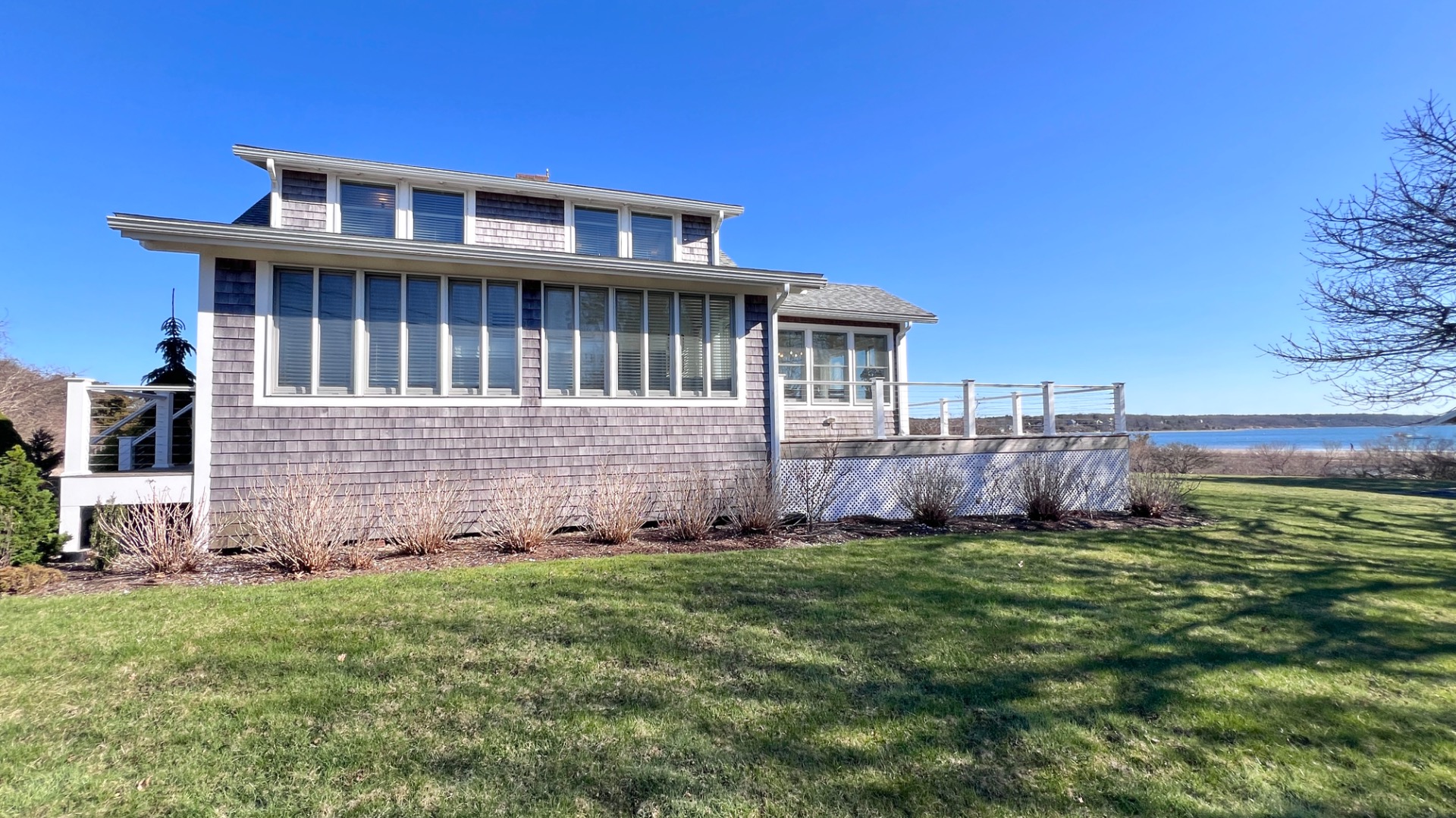 34 Windemere Road Oak Bluffs, MA 02557 - Photo 59 of 64 a view of a house with a yard