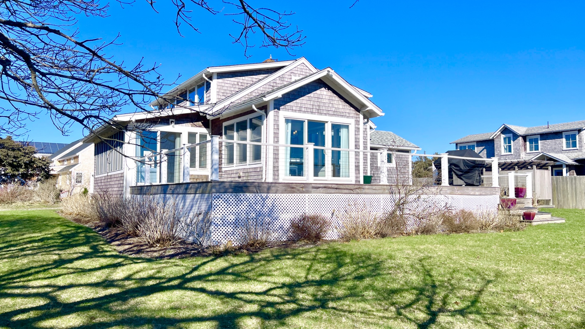 34 Windemere Road Oak Bluffs, MA 02557 - Photo 7 of 64 a front view of a house with a yard