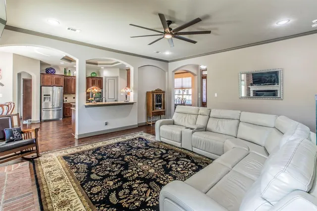 a living room with furniture and a rug