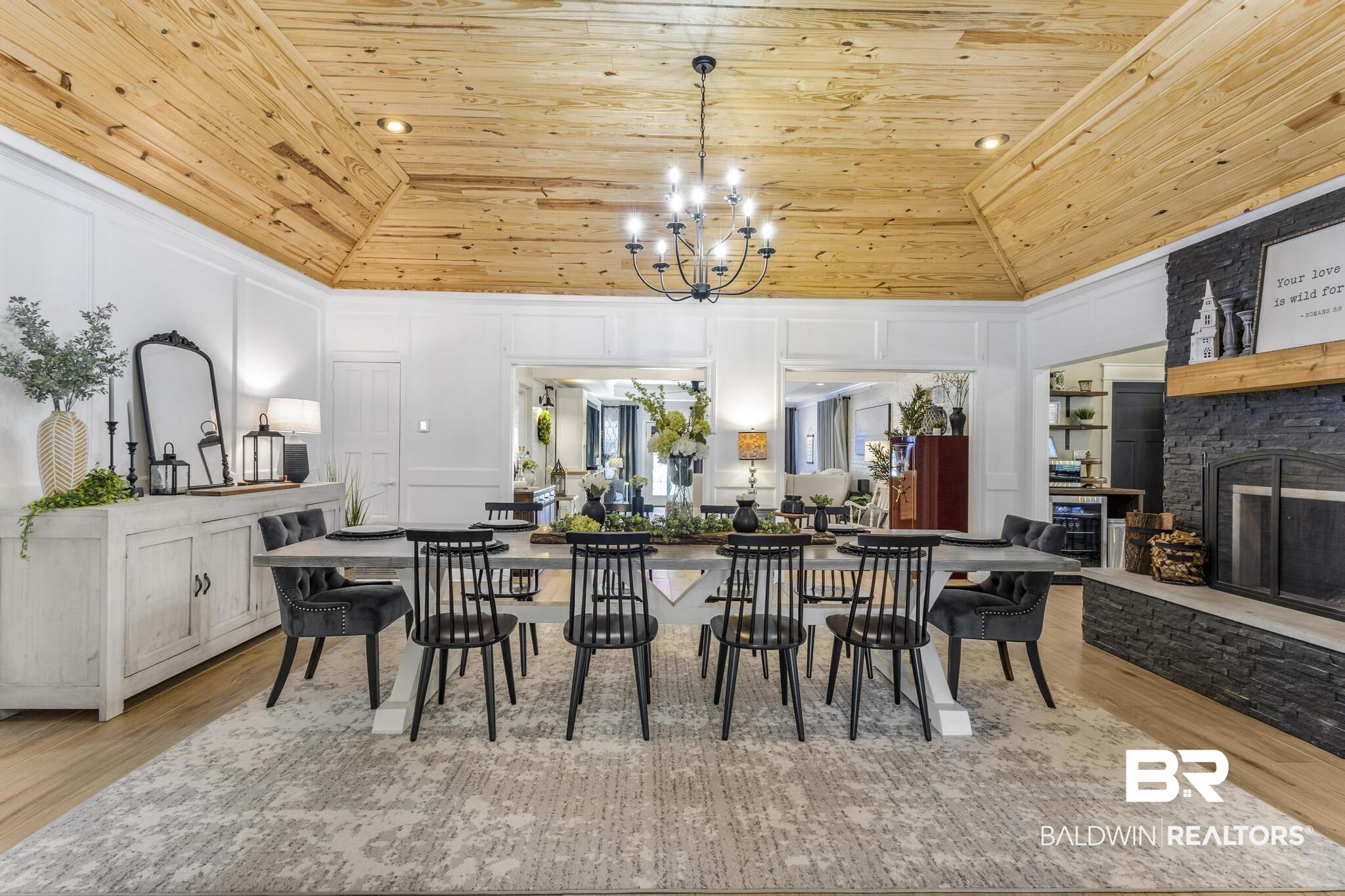 83 Caisson Trace Daphne, AL 36527 - Photo 11 of 63 Vaulted wood-finish ceiling featuring recessed lighting and a central chandelier