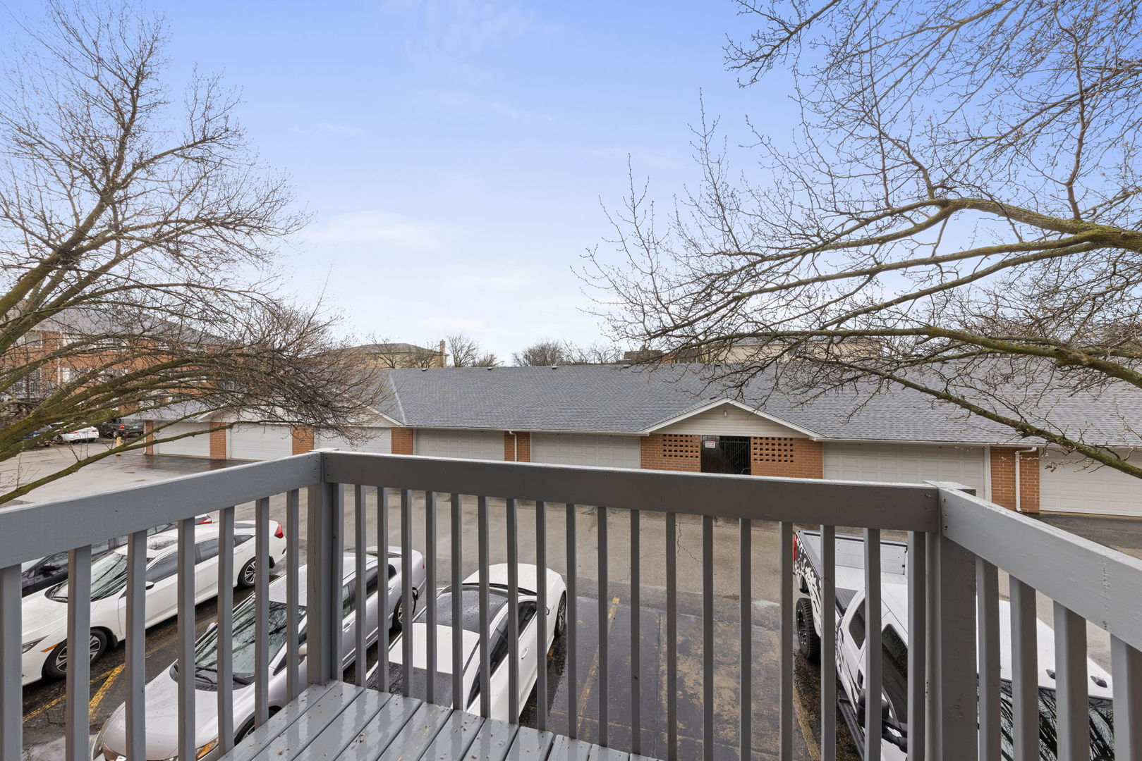 1344 South Lorraine Road, Unit E Wheaton, IL 60189 - Photo 22 of 26 a view of houses with a yard