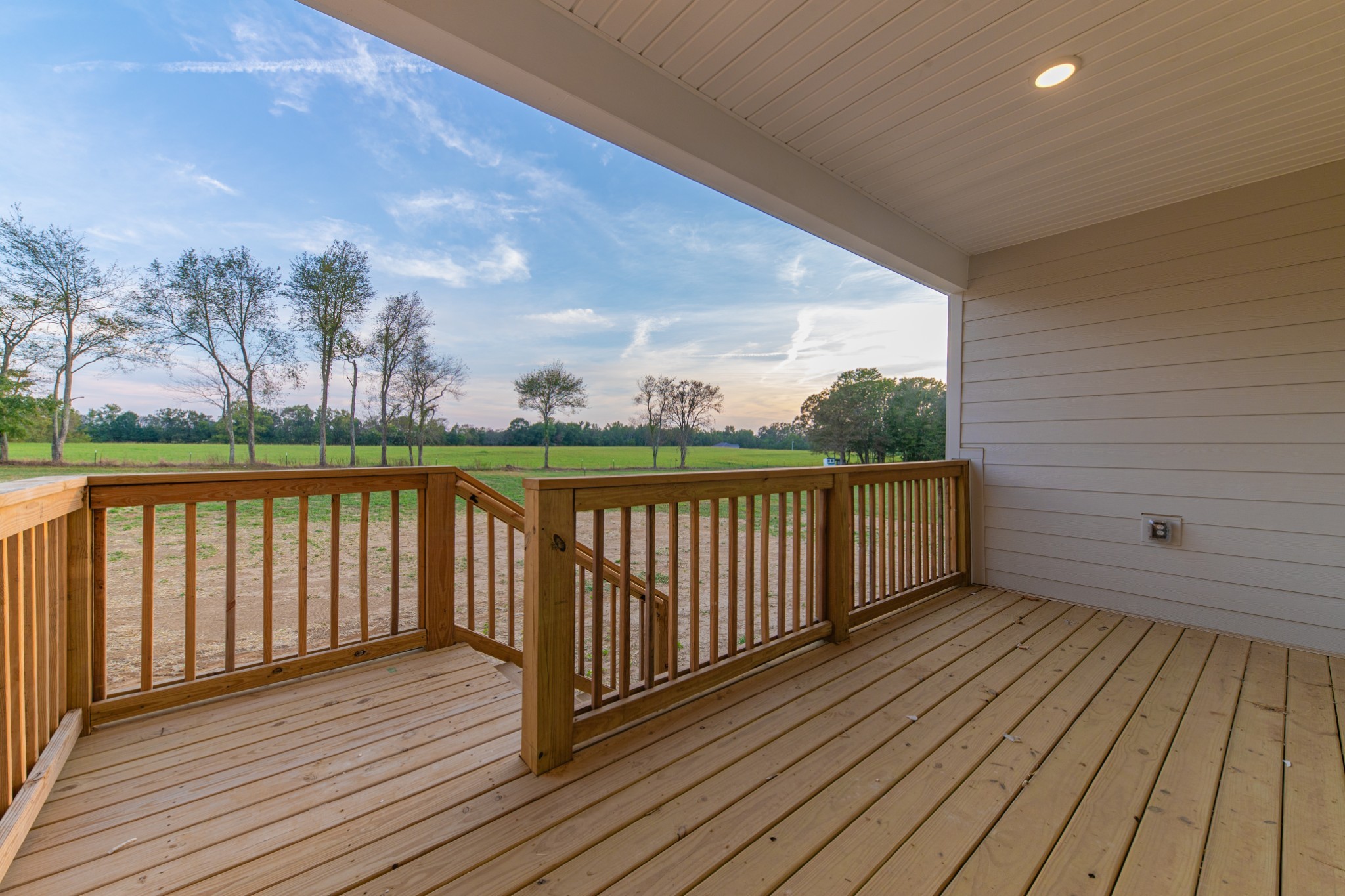232 Dugout Road Summertown, TN 38483 - Photo 19 of 64 a balcony with wooden floor and fence