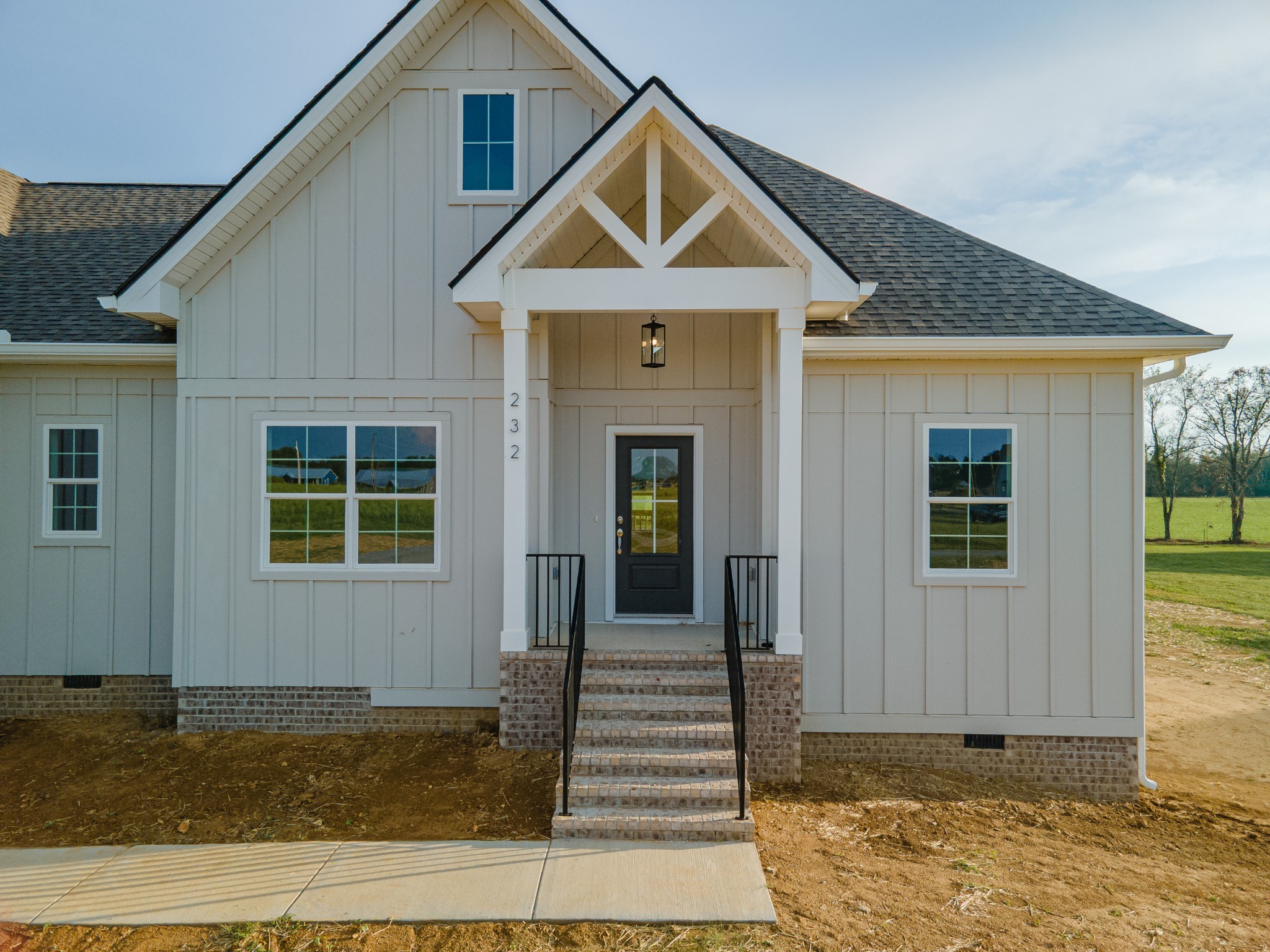 232 Dugout Road Summertown, TN 38483 - Photo 8 of 64 a front view of a house with a yard
