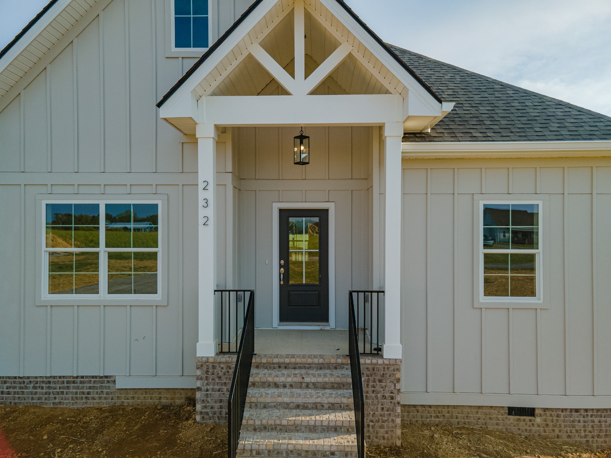 232 Dugout Road Summertown, TN 38483 - Photo 9 of 64 a front view of a house with a yard