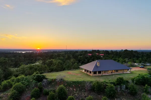a view of a town with mountains in the background