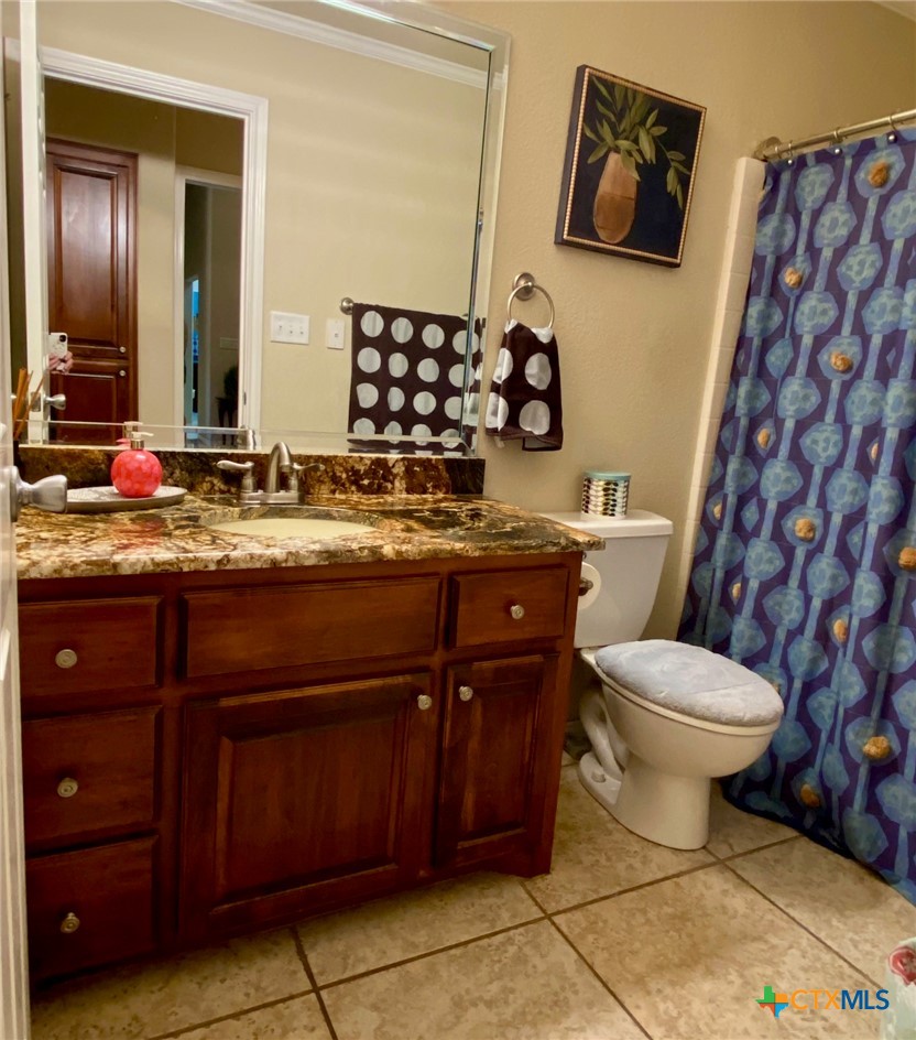 210 Ranchgate Trail McGregor, TX 76657 - Photo 26 of 33 Bathroom for bedroom 2