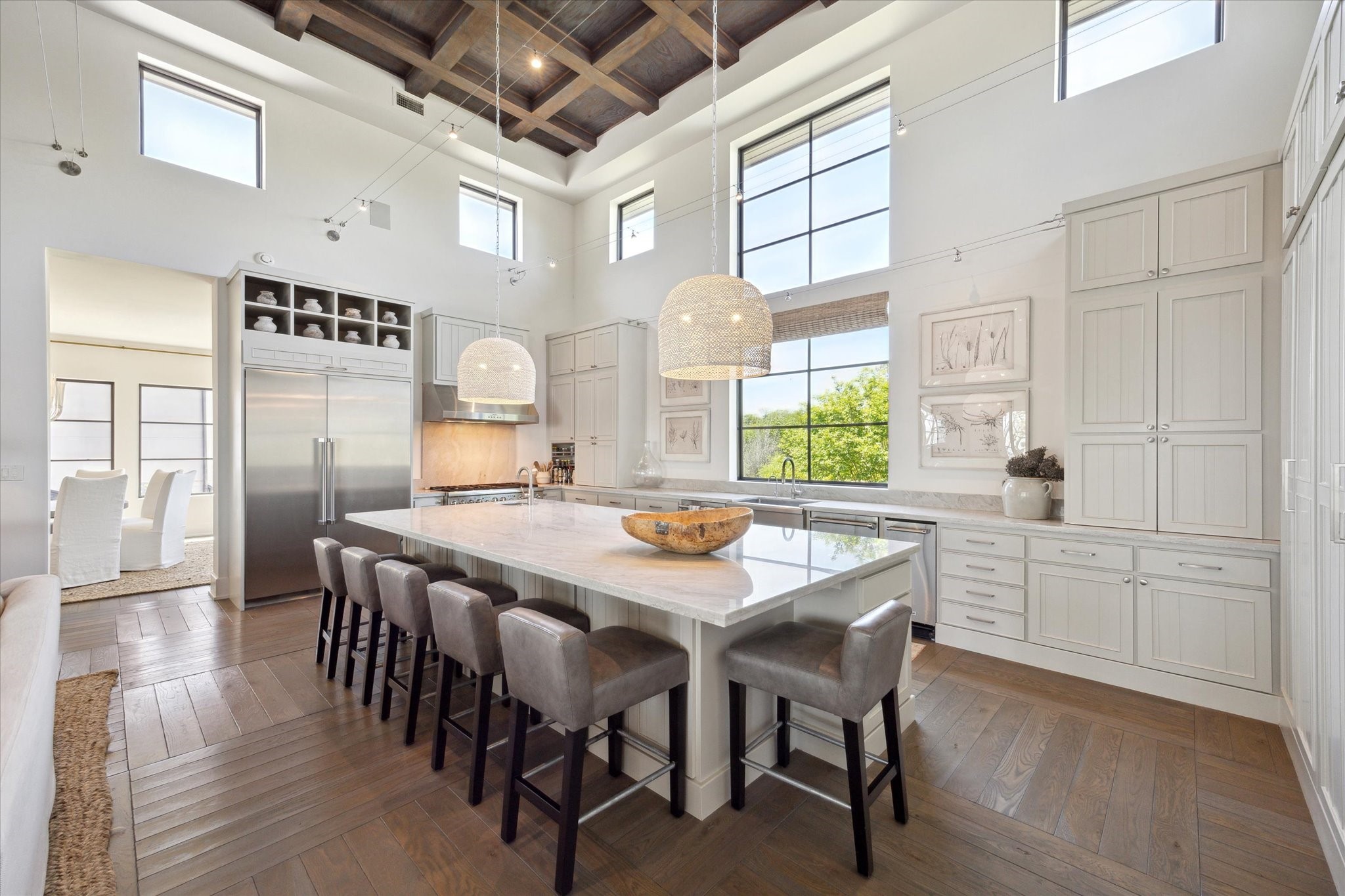 633 Quintana Roo Place Seabrook, TX 77586 - Photo 14 of 47 The light-filled kitchen boasts a conversational island, top-of-the-line appliances, two sinks, two dishwashers, and mesmerizing views to soak in.