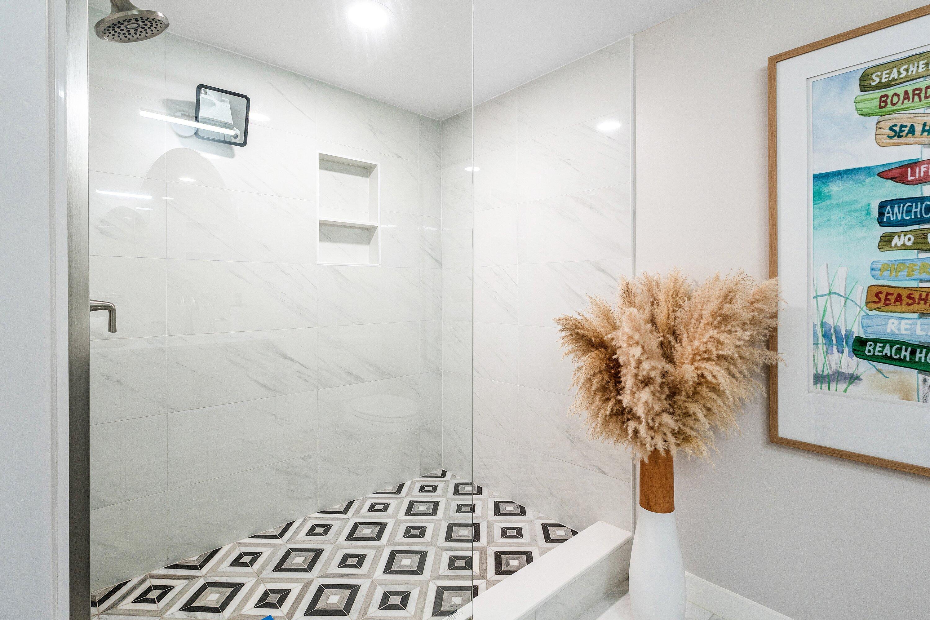 7918 Granada Place, Unit 103 Boca Raton, FL 33433 - Photo 16 of 31 a bath room with a potted plant and a shower