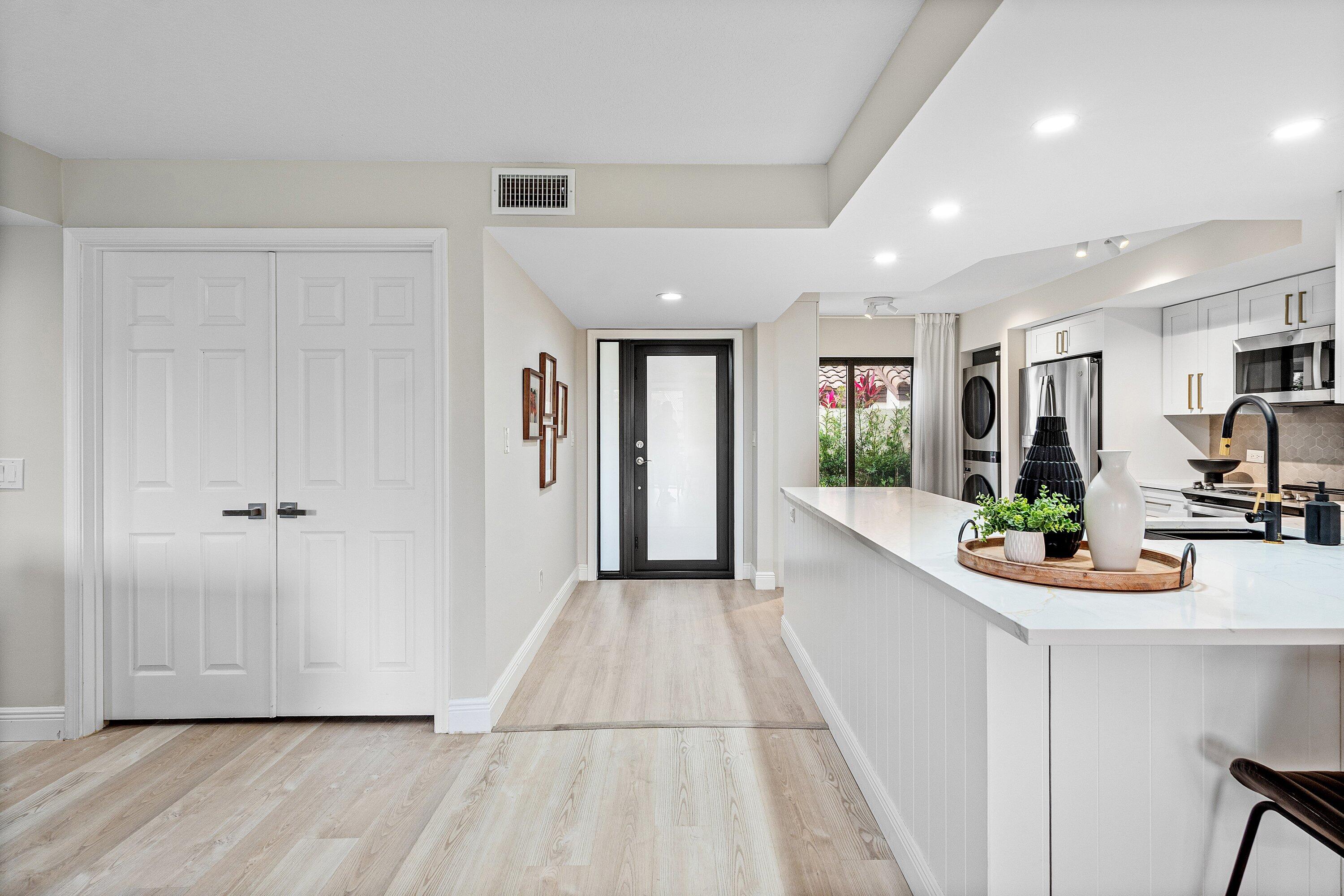 7918 Granada Place, Unit 103 Boca Raton, FL 33433 - Photo 3 of 31 a view of a living room and entry way