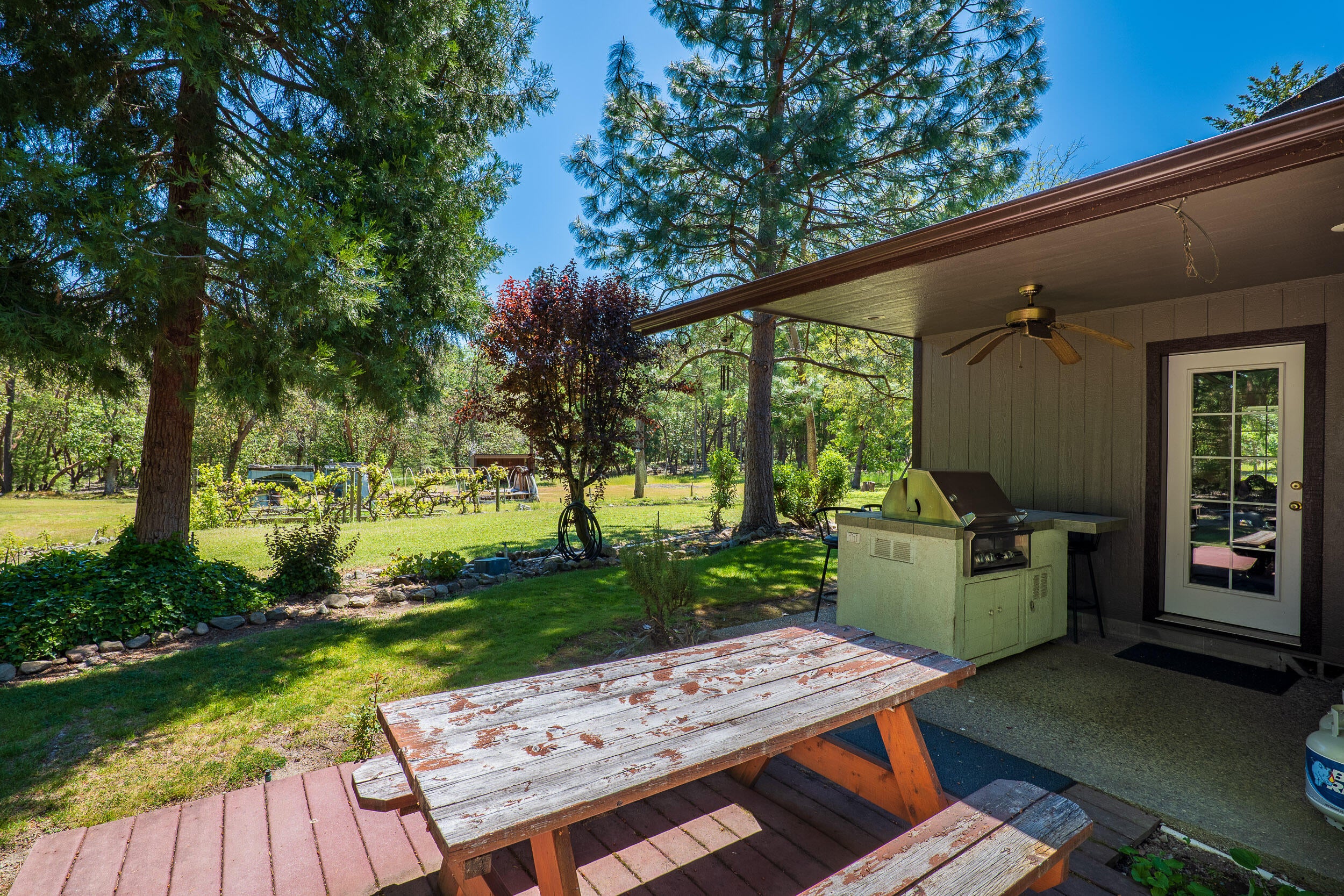 14845 Water Gap Road Williams, OR 97544 - Photo 33 of 44 Covered Patio w/ Built in BBQ