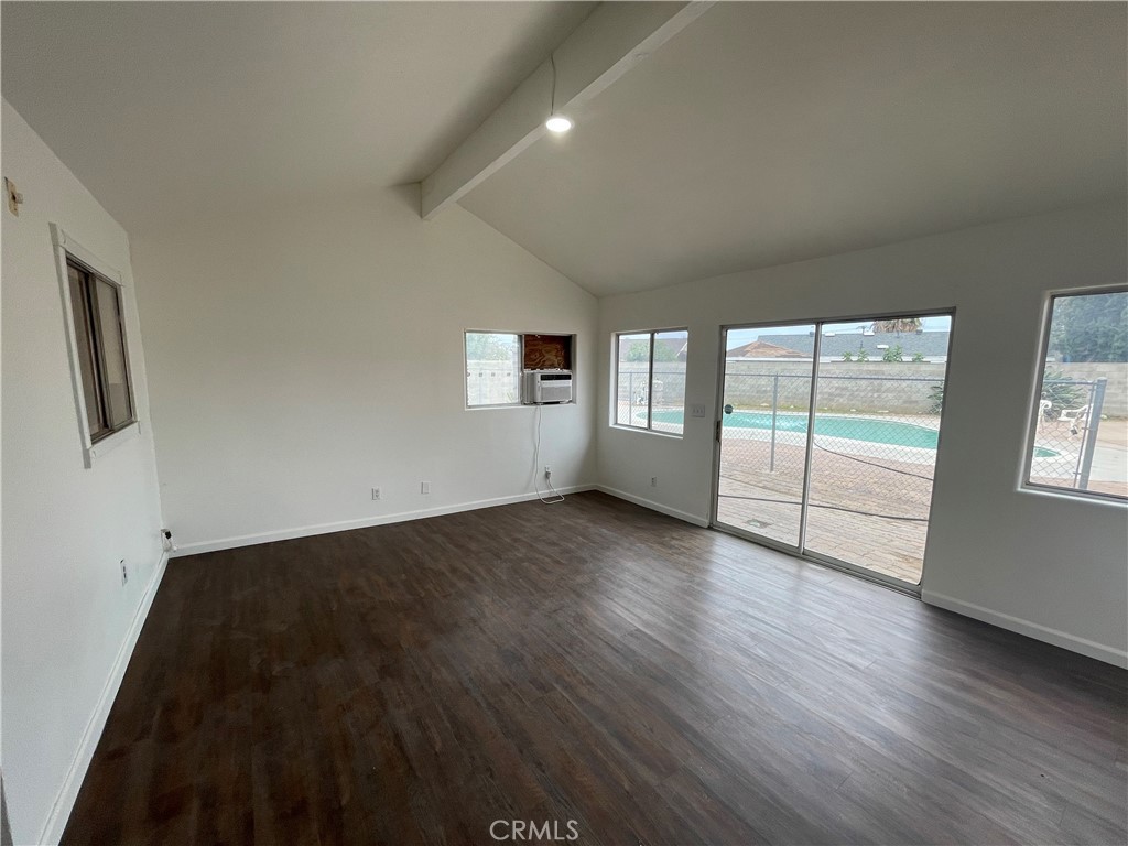 25141 Silent Creek Road Moreno Valley, CA 92553 - Photo 26 of 40 wooden floor in an empty room with a window