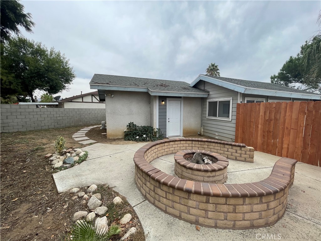 25141 Silent Creek Road Moreno Valley, CA 92553 - Photo 36 of 40 a view of a house with backyard