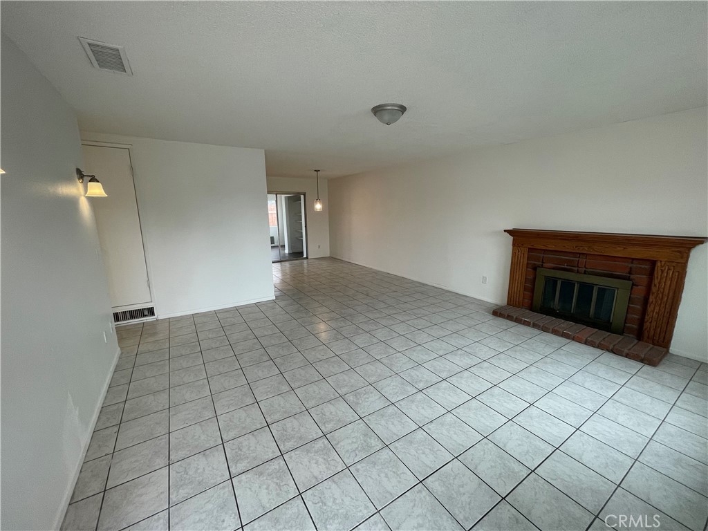 25141 Silent Creek Road Moreno Valley, CA 92553 - Photo 6 of 40 a view of an empty room and window