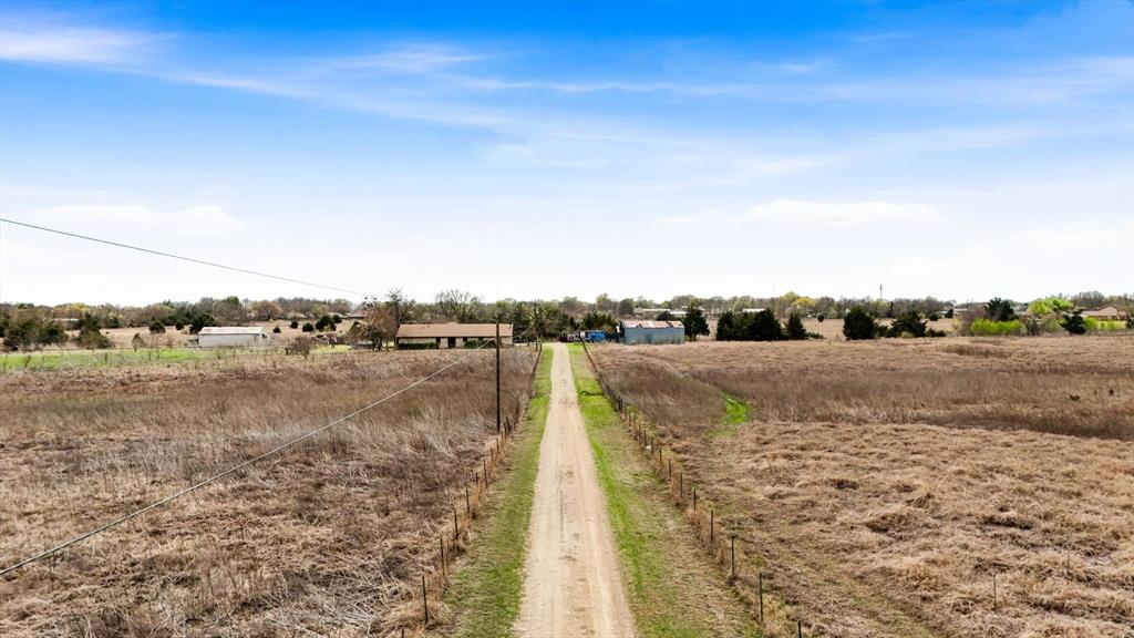 801 East Fm-664 Road Red Oak, TX 75154 - Photo 15 of 22 View of dirt / gravel road featuring a rural view