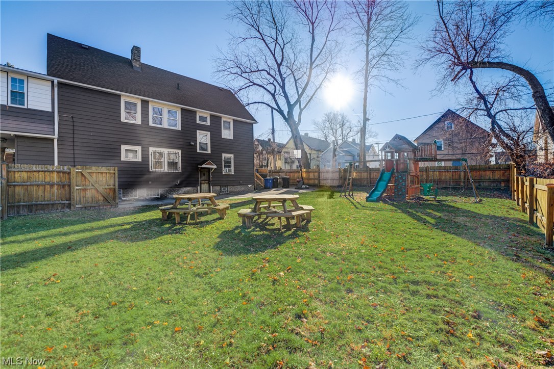 14202 Glenside Road Cleveland, OH 44110 - Photo 35 of 41 View of yard with a playground