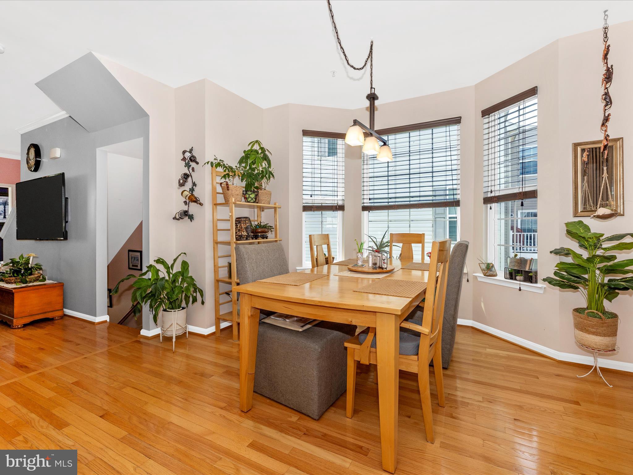 12954 Yellow Jacket Road Hagerstown, MD 21740 - Photo 14 of 54 a view of a dining room with furniture window and wooden floor