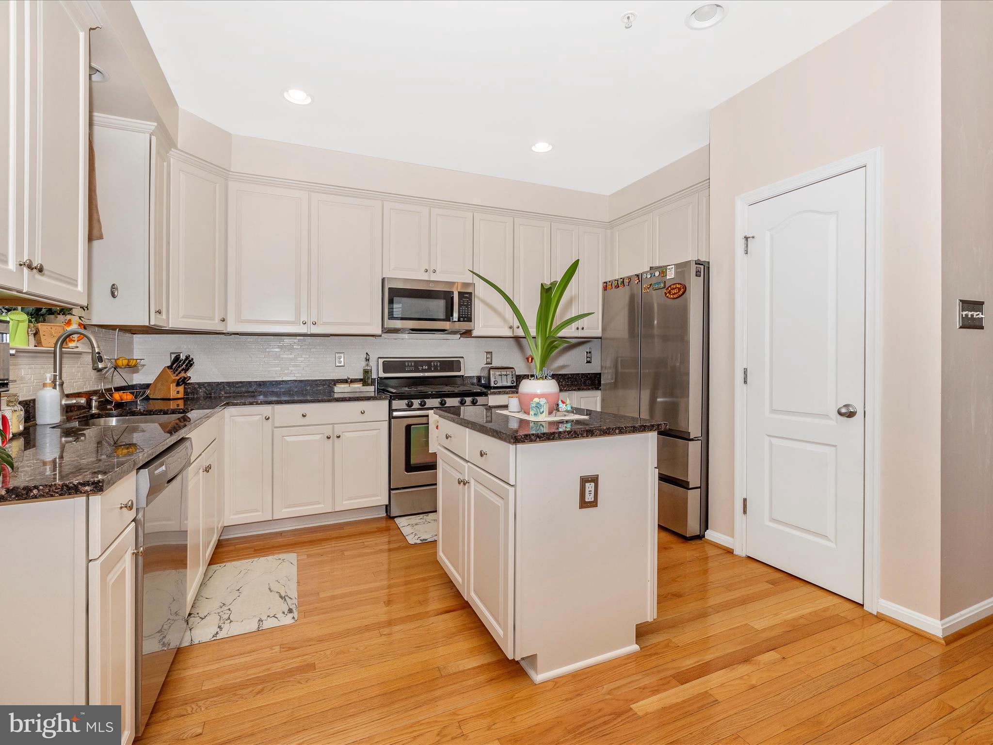 12954 Yellow Jacket Road Hagerstown, MD 21740 - Photo 16 of 54 a kitchen with stainless steel appliances granite countertop a refrigerator sink and stove