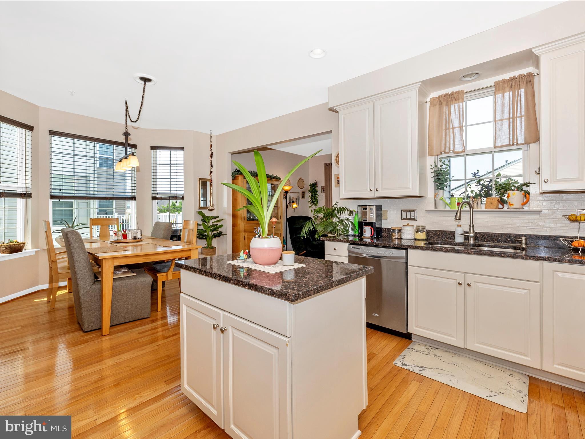 12954 Yellow Jacket Road Hagerstown, MD 21740 - Photo 18 of 54 a kitchen that has a lot of cabinets in it with granite countertop wooden cabinets