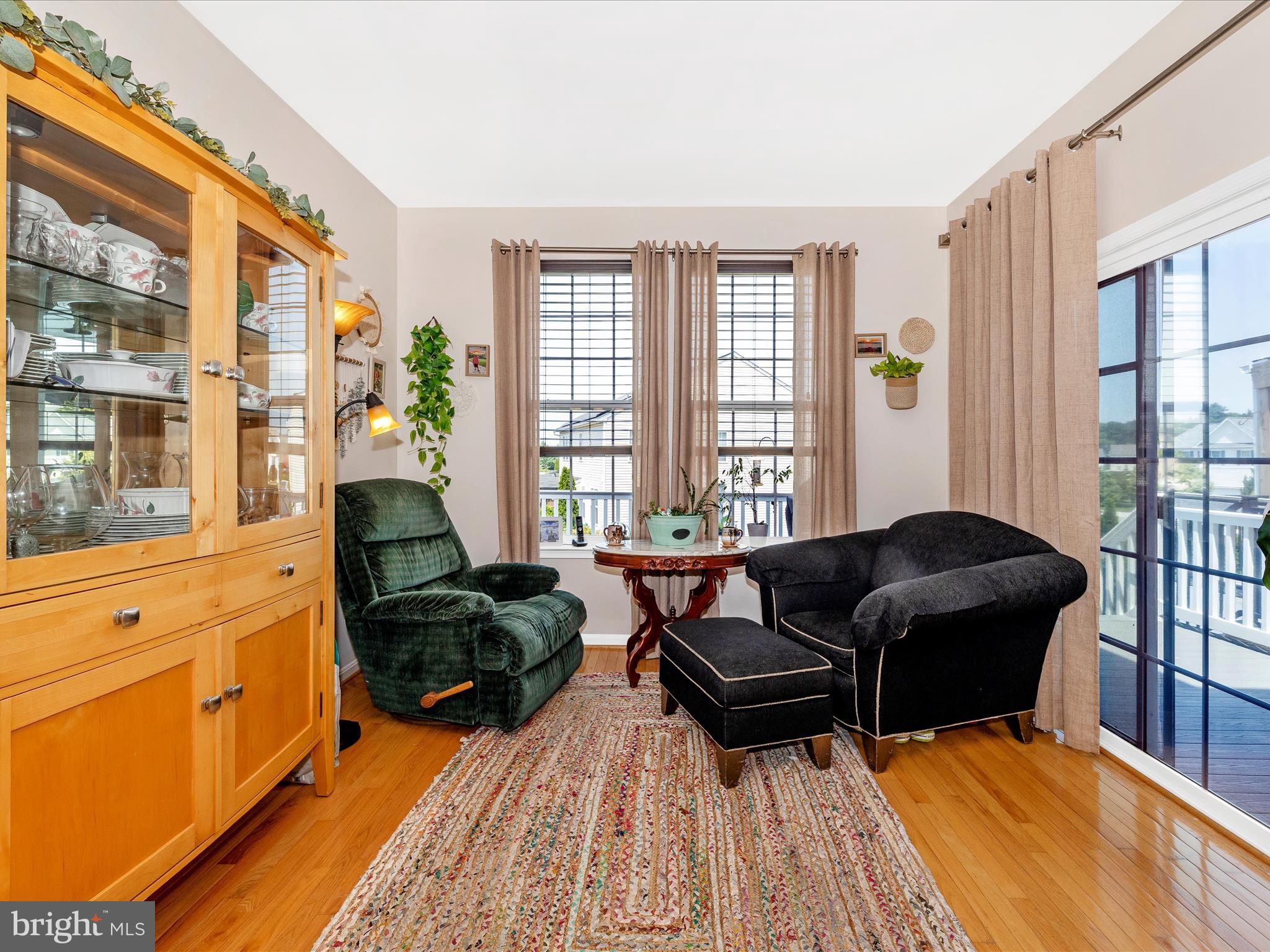 12954 Yellow Jacket Road Hagerstown, MD 21740 - Photo 20 of 54 a living room with furniture and large windows