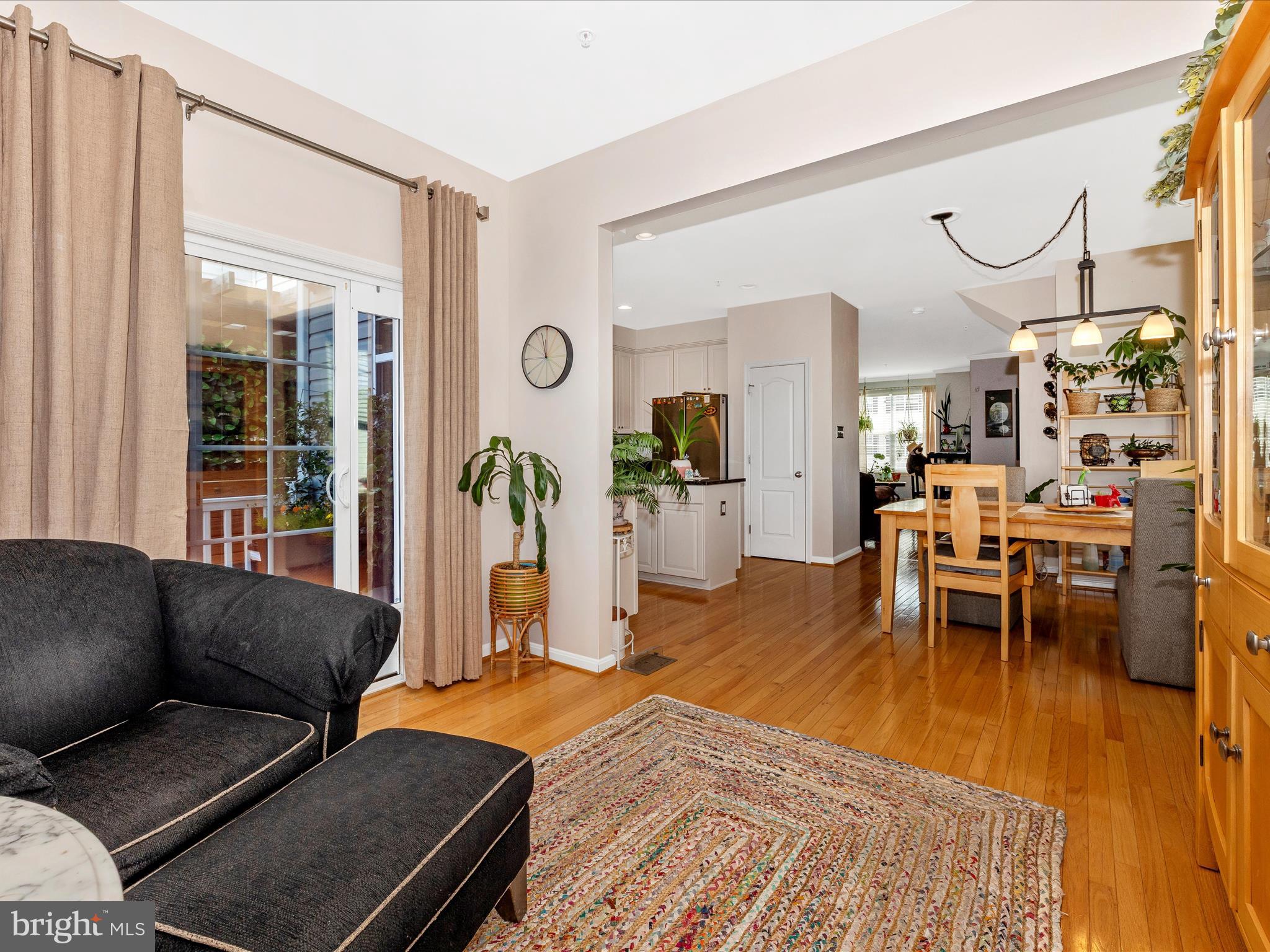 12954 Yellow Jacket Road Hagerstown, MD 21740 - Photo 21 of 54 a living room with furniture and wooden floor