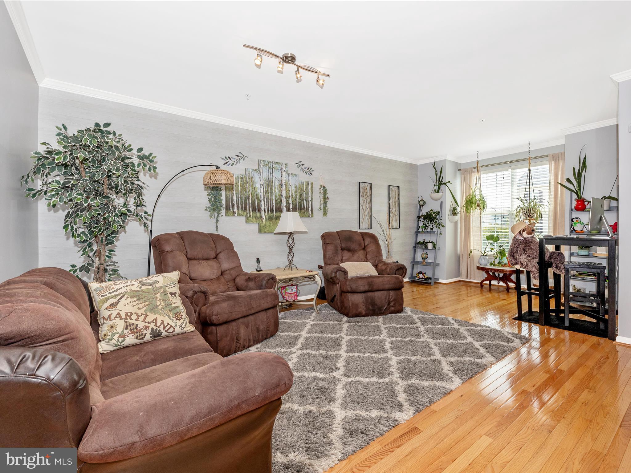 12954 Yellow Jacket Road Hagerstown, MD 21740 - Photo 22 of 54 a living room with furniture and wooden floor