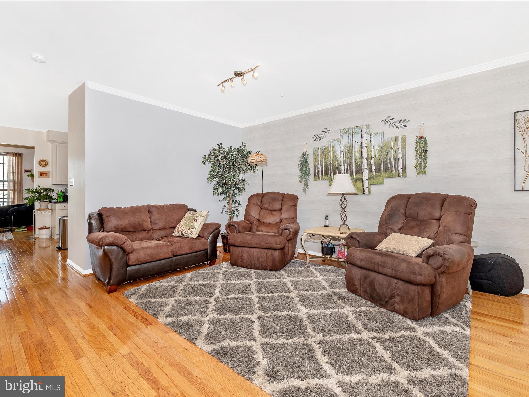 12954 Yellow Jacket Road Hagerstown, MD 21740 - Photo 23 of 54 a living room with furniture and wooden floor
