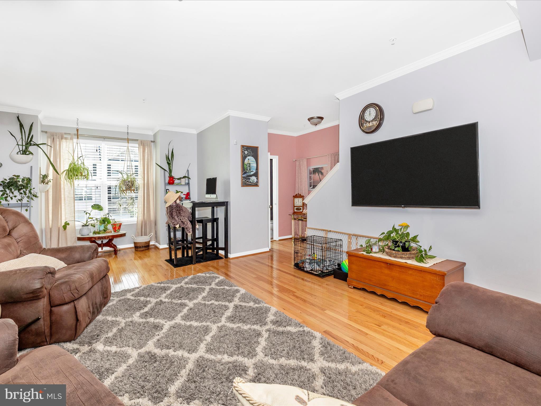 12954 Yellow Jacket Road Hagerstown, MD 21740 - Photo 25 of 54 a living room with furniture and a flat screen tv