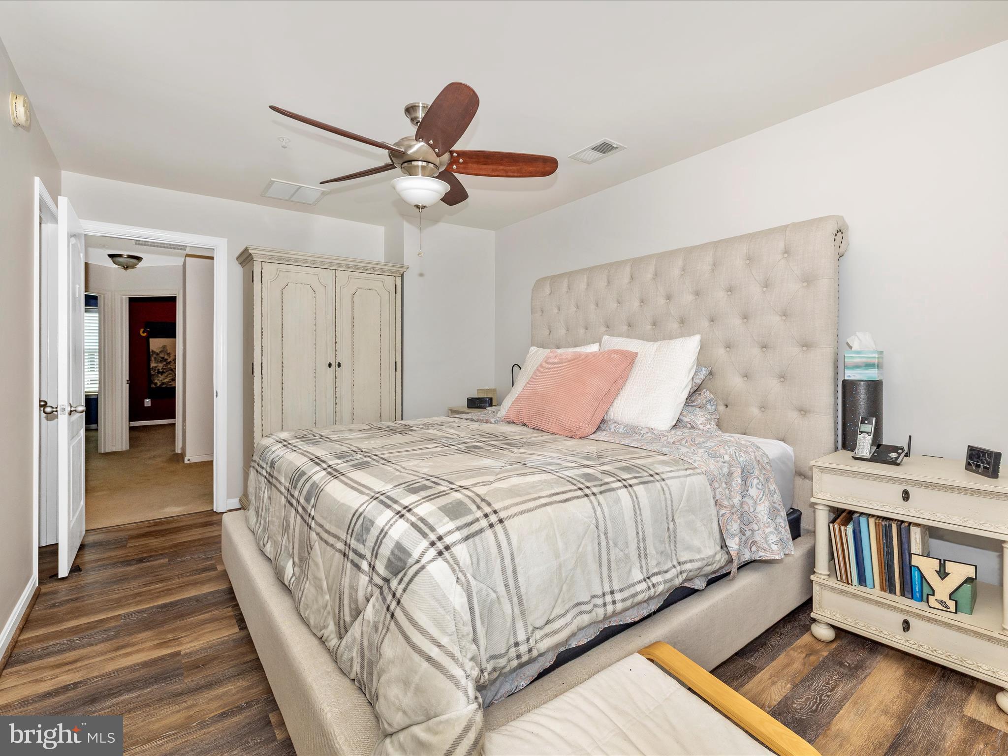 12954 Yellow Jacket Road Hagerstown, MD 21740 - Photo 31 of 54 a bedroom with a bed and a ceiling fan