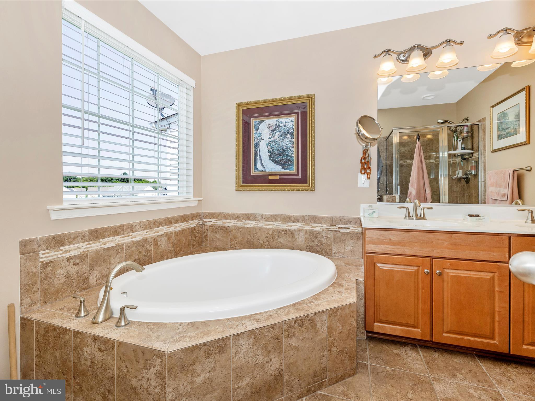 12954 Yellow Jacket Road Hagerstown, MD 21740 - Photo 35 of 54 a bath tub sitting next to a bathroom sink