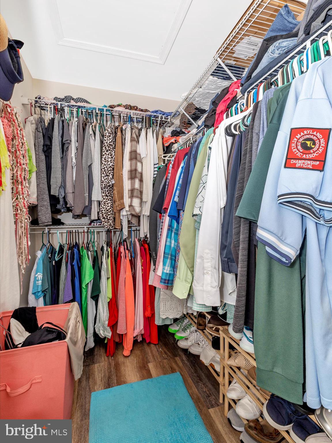 12954 Yellow Jacket Road Hagerstown, MD 21740 - Photo 36 of 54 a view of walk in closet with clothes and shoes