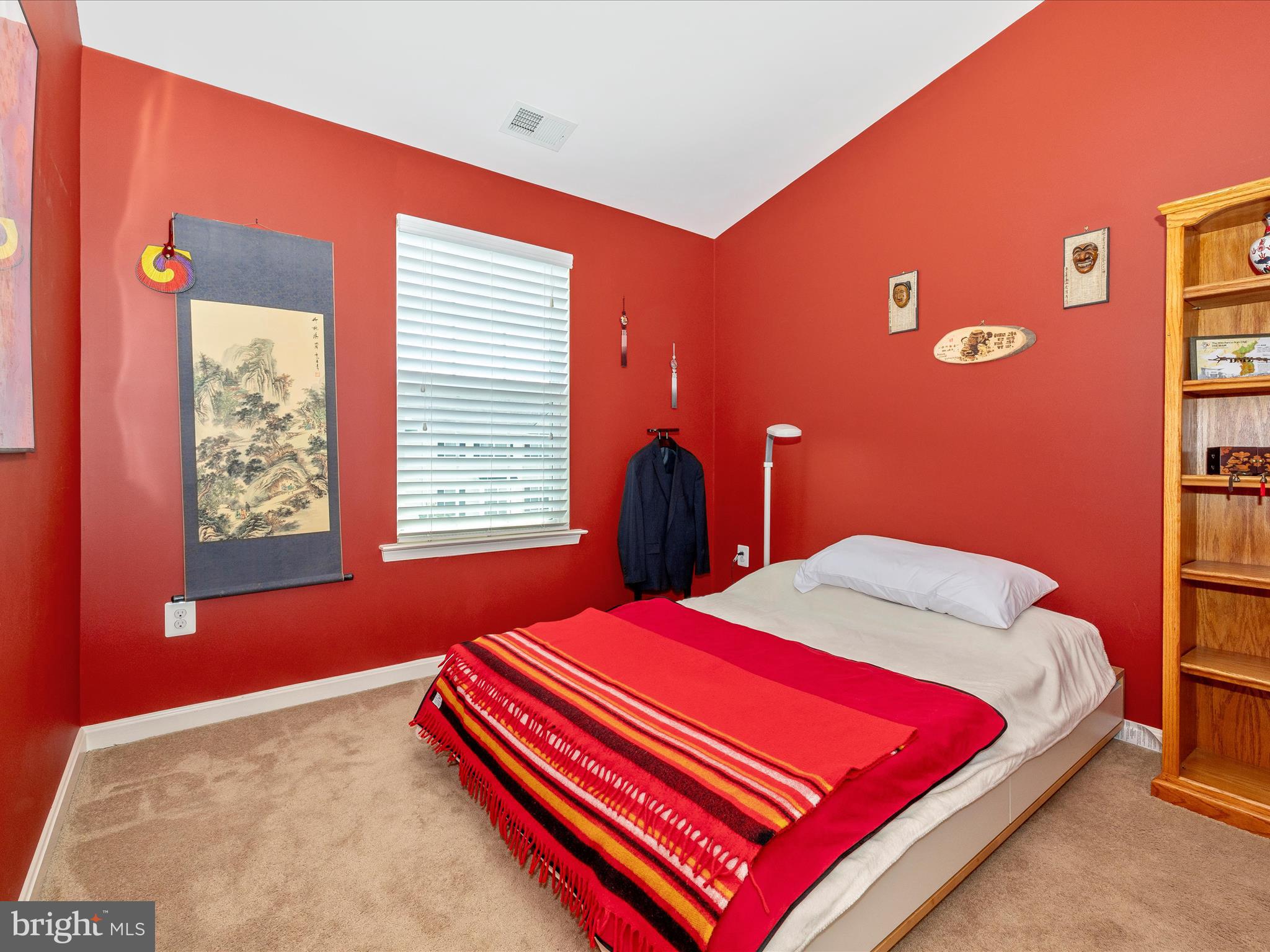 12954 Yellow Jacket Road Hagerstown, MD 21740 - Photo 37 of 54 a bedroom with a bed and a dresser next to a window