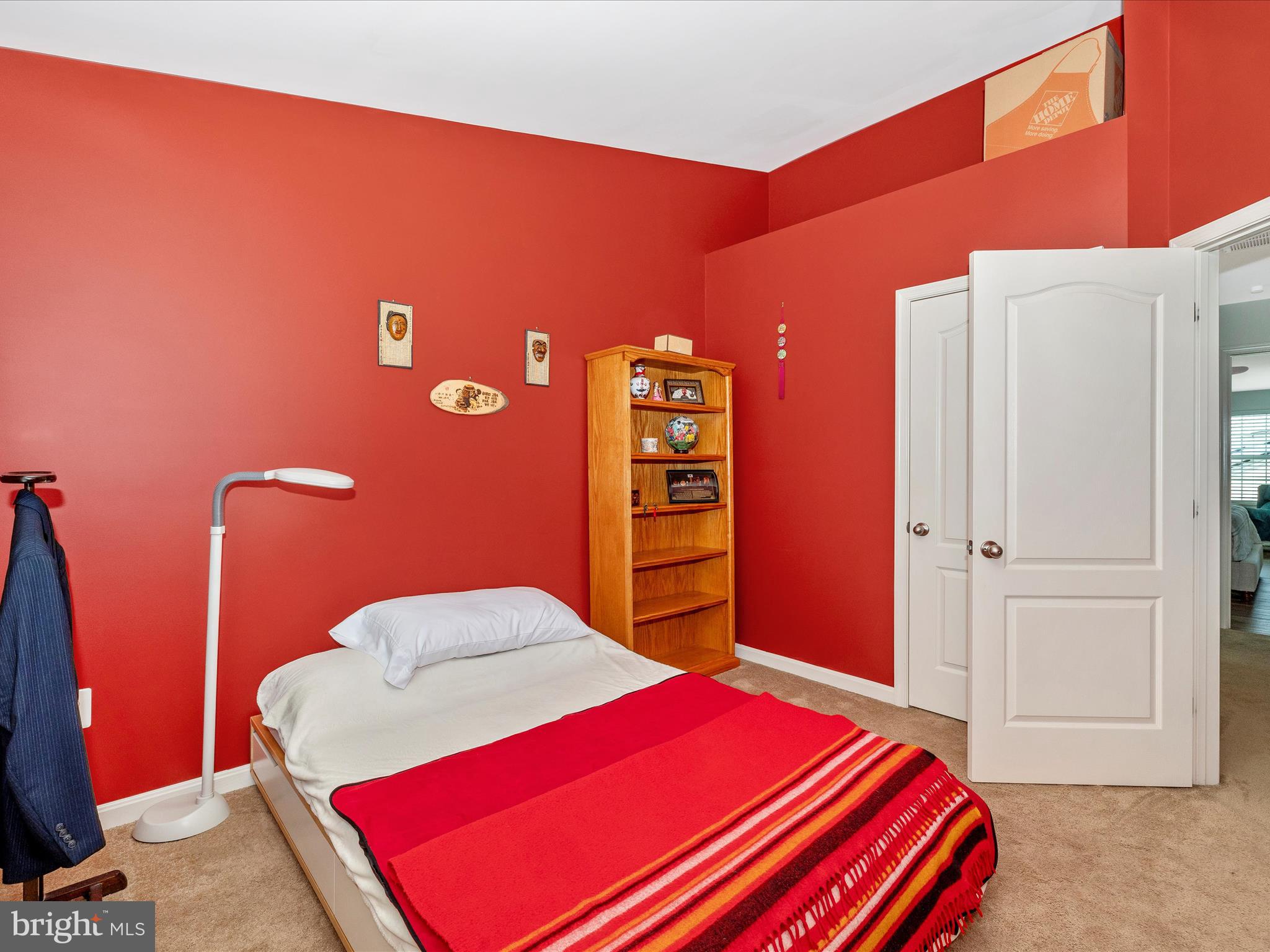 12954 Yellow Jacket Road Hagerstown, MD 21740 - Photo 38 of 54 a bedroom with a bed and a lamp with closet