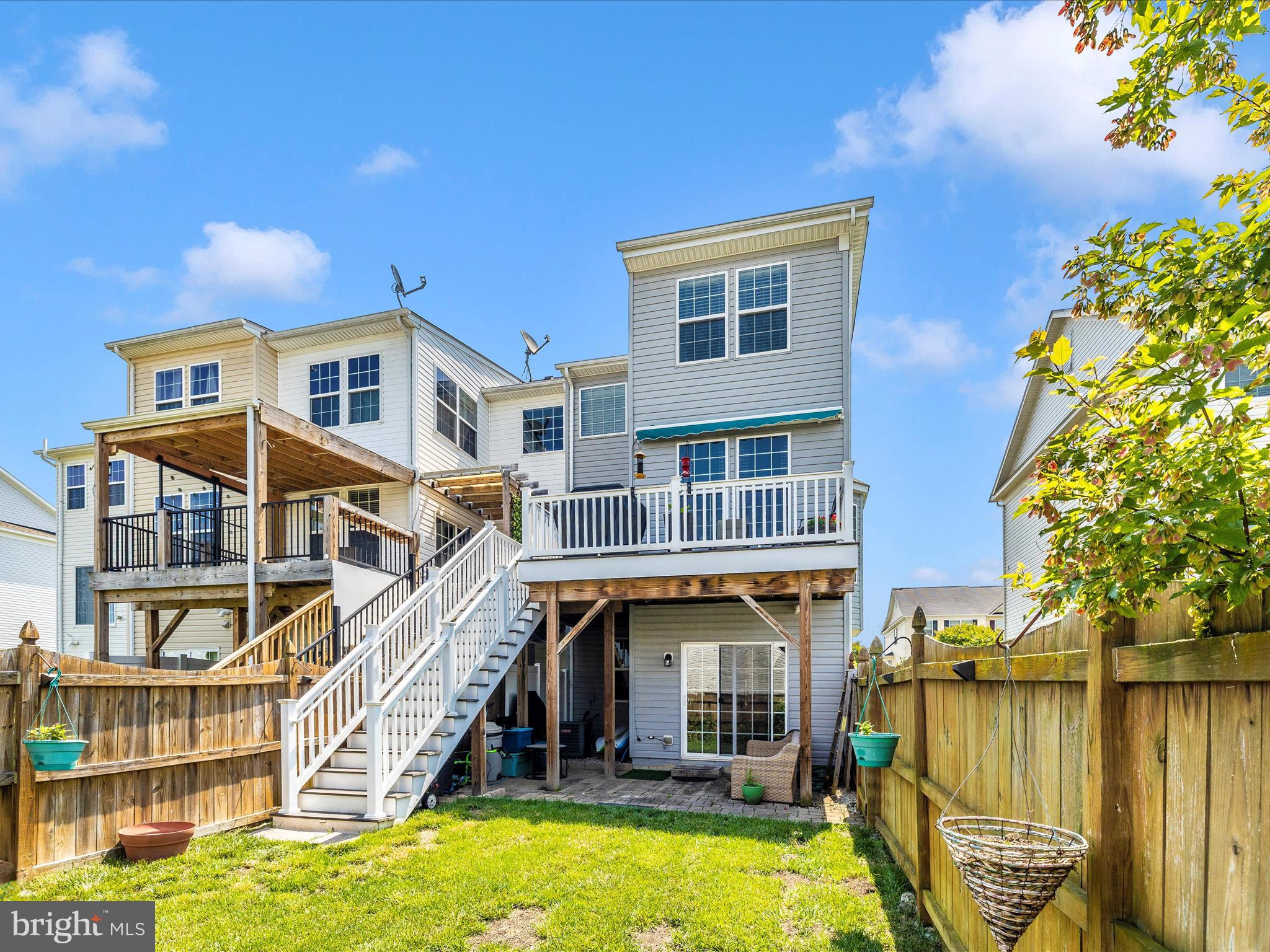 12954 Yellow Jacket Road Hagerstown, MD 21740 - Photo 45 of 54 a front view of a house with a yard table and chairs